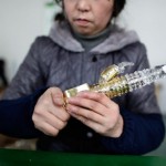 Chinese woman with dildo