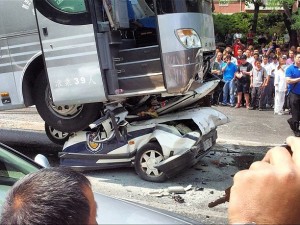 Bus on police car