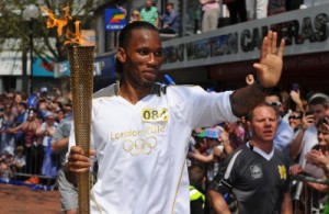 Drogba puts torch-carrying duties over Shanghai team announcements