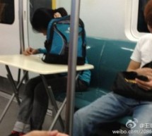 Studying In The Subway, On A Portable Desk