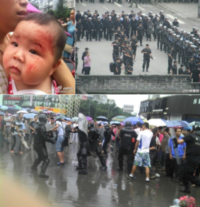 Baby and riot police, a study in contrasts