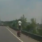 Cop Politely Tells Man To Stop Standing On Moving Motorcycle