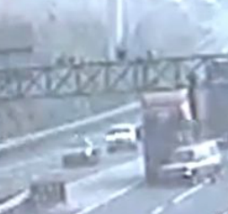 Driver Tries To Cut In Front Of Truck On Highway, Fails Utterly featured image