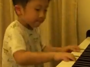 Watch This Supposed Four-Year-Old On The Piano featured image