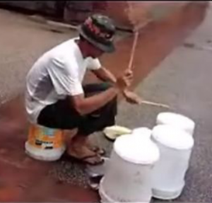 This Busker Drums To His Own Beat