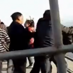 Security Guards Close Metal Gate On Tourists Before Beating Them Over Ticket Dispute