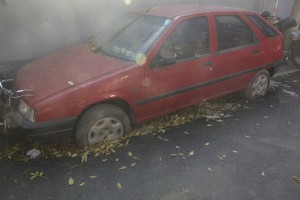 Car stuck in pavement