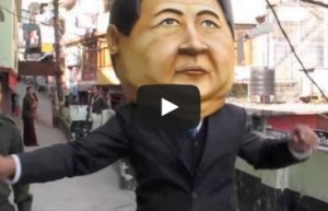 Oversized Xi Jinping head, Gangnam Style