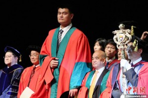 Yao Ming getting diploma... or being ordained