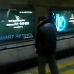 Beijing man pees off subway platform