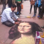 Street Artist Does Damn Good Chalk Etching Of Mona Lisa (Video)