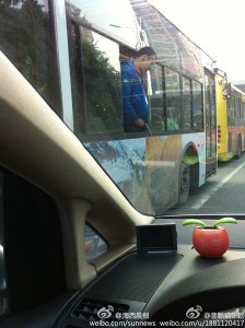 Man pees from bus window