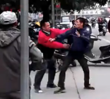 Watch A Cop Almost Do Something About This Fight