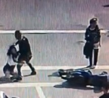 Male And Female Grapple And Kick After Their Scooters Collide