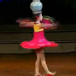 North Korean Girl Spins With Vase On Her Head, Impressively, For 45 Seconds