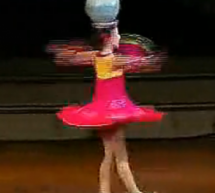 North Korean Girl Spins With Vase On Her Head, Impressively, For 45 Seconds