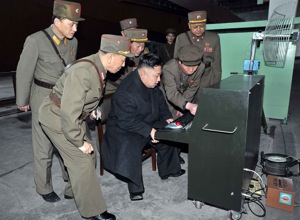 North Korean leader Kim Jong-un looks at the latest combat and technical equipments, made by unit 1501 of the Korean People's Army, during his visit to the unit