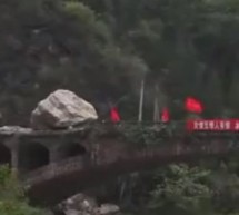 Watch As A Demolition Team, As Part Of Post-Earthquake Efforts, Blows Up A Boulder Blocking A Road