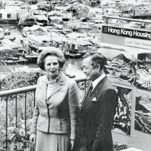 Margaret Thatcher visits the Aberdeen Housing Estate on December 20, 1984, accompanied  by housing official L.K. Chan (Bettmann/CORBIS)