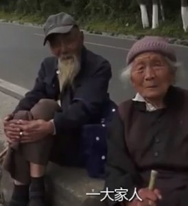 Old couple walking while holding hands