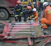 Yikes: Sand Truck Flips Onto A Car, Flattening It Completely, Killing Driver