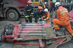 Sedan squashed flat as a pancake in Mianzhu, Sichuan