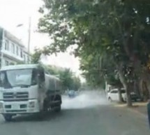 Driver Speeds Up To Shield Old Woman From Water Truck