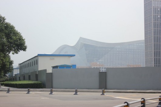 From about 300 meters away, the new Global Center fades under a midday mist. Photo also in black and white, below -- check out how similar it looks with "color"!
