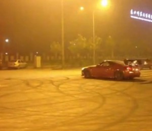 Car does donuts in Beijing