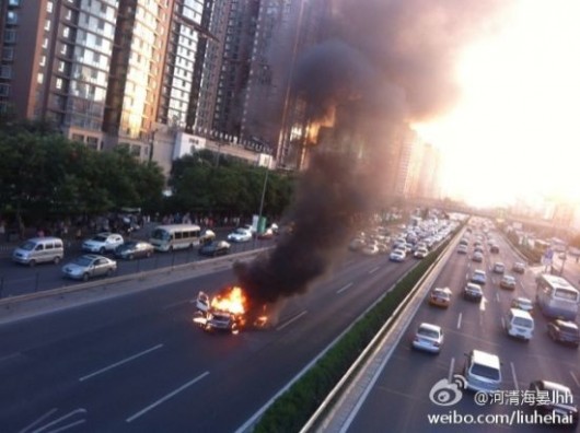 Car on fire on Fourth Ring Road Beijing 1