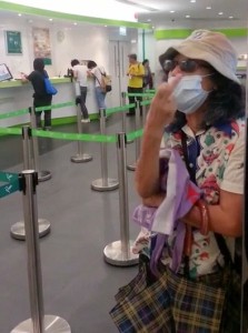 Crazy racist Hong Kong woman at post office