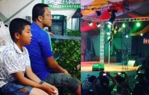 Boy and father watch pole dancing