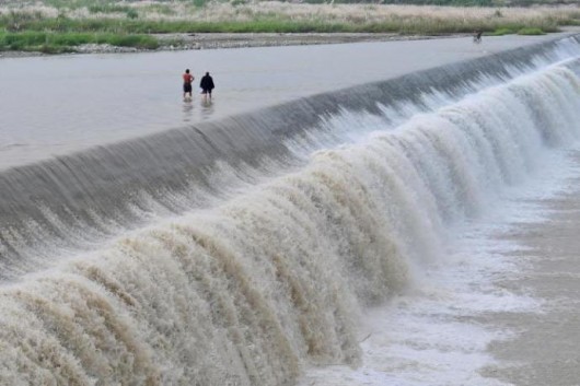Pengzhou wading and fording through river 5