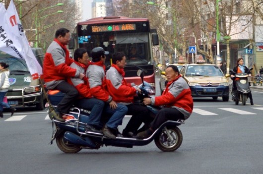 5 men 1 scooter