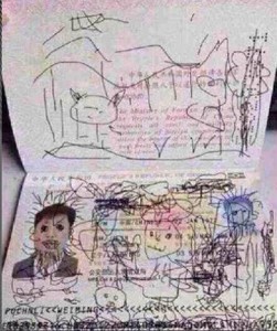 Child draws on dad's passport . credit the family please