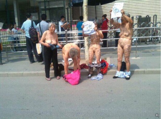 Naked grandmother protest outside US embassy